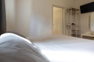 Postel nebo postele na pokoji v ubytování B&B La Camia