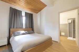 Postel nebo postele na pokoji v ubytování B&B La Camia