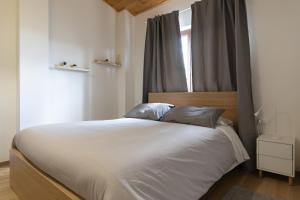 Postel nebo postele na pokoji v ubytování B&B La Camia