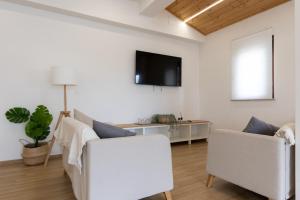 TV a/nebo společenská místnost v ubytování B&B La Camia