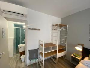 a small room with a bed and a closet at B&B 125Metri sul mare in Sirolo