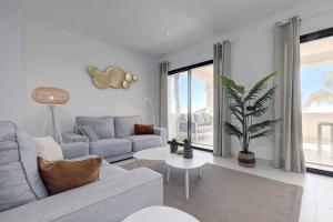 A seating area at 2 Bed Apartment at Estepona Hills with great Sea Views!