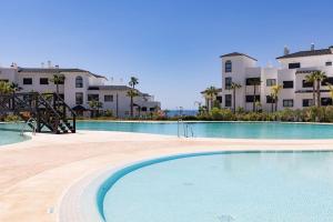 The swimming pool at or close to 2 Bed Apartment at Estepona Hills with great Sea Views!