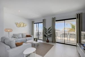 A seating area at 2 Bed Apartment at Estepona Hills with great Sea Views!