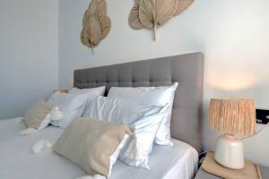 A bed or beds in a room at 2 Bed Apartment at Estepona Hills with great Sea Views!