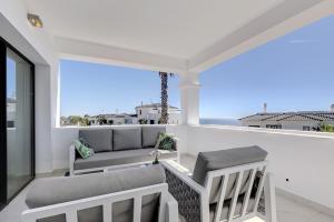 A balcony or terrace at 2 Bed Apartment at Estepona Hills with great Sea Views!