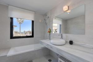 A bathroom at 2 Bed Apartment at Estepona Hills with great Sea Views!