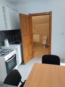 Η κουζίνα ή μικρή κουζίνα στο Whitestar Guesthouse