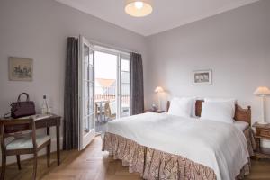 Postel nebo postele na pokoji v ubytování Hotel Fredensborg Store Kro