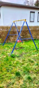 Ein Kinderspielbereich in der Unterkunft Am Schwielochsee 2