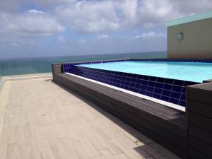 a large swimming pool on top of a building at Miramare_5 appartamento in Castelsardo