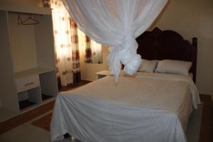Dynamic Fully Furnished Apartments in Nairobi, 14 km from Jomo Kenyatta International Airport and the SGR客房内的一张或多张床位