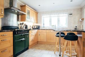 Nhà bếp/bếp nhỏ tại Inglewood Cottage