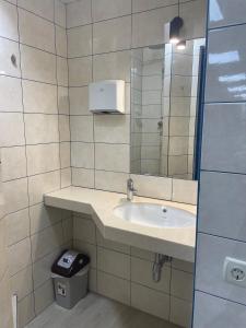 Vonios kambarys apgyvendinimo įstaigoje Hostel GARDEN St