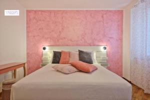 Postel nebo postele na pokoji v ubytování Casetta Mazzini + 33 fotografií