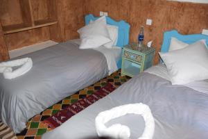 Kasbah Assafar客房内的一张或多张床位