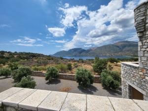 a view of a lake from a building at Mani Tower in Kamáres