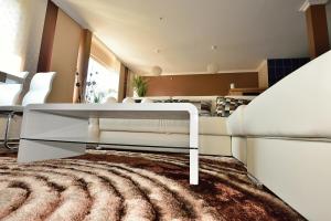 A bed or beds in a room at Angel's Apartment
