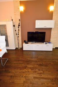 A television and/or entertainment centre at Angel's Apartment
