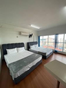 Katil atau katil-katil dalam bilik di 4PAX near USM n Pantai Hospital n PISA SPI CE ARENA
