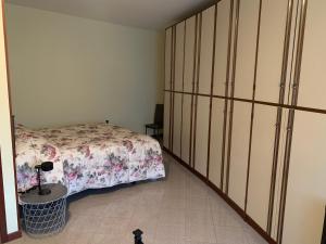 Postel nebo postele na pokoji v ubytování All’angolo