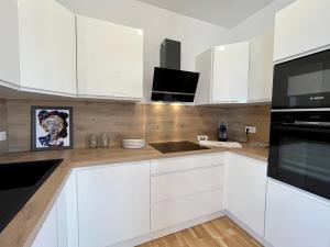Zdjęcie z galerii obiektu kallistella, splendide T3 neuf de haut standing en toit terrasse dominant le golfe d'Ajaccio, terrasse de 70m2 w Ajaccio