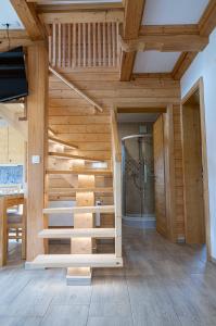 a room with a sauna with wooden walls at Hiša Breza in Mozirje