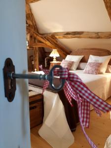 Postel nebo postele na pokoji v ubytování CAPMASIL Maison d'hôtes et Spa + 27 fotografií