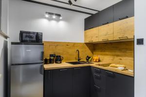 Kuchyňa alebo kuchynka v ubytovaní P&O Apartments Sobieskiego - Mokotów