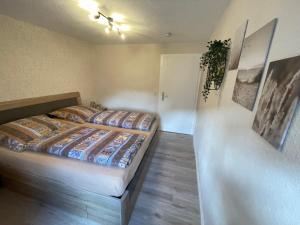 Postel nebo postele na pokoji v ubytování Moselferienhaus Porten