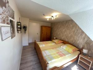Postel nebo postele na pokoji v ubytování Moselferienhaus Porten