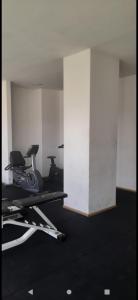 a room with two exercise bikes in a gym at Roca771 908 in Buenos Aires