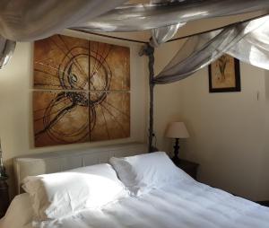Ein Bett oder Betten in einem Zimmer der Unterkunft Villa Bruna