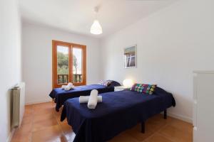 Postel nebo postele na pokoji v ubytování Playa de Muro - Nordvillas