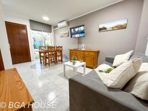 a living room with a couch and a table at Bga Rentals Aini in Cambrils