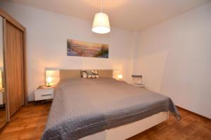 Postel nebo postele na pokoji v ubytování Haus "Luv und Lee" Appartement LUV29