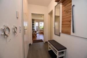 TV a/nebo společenská místnost v ubytování Haus "Luv und Lee" Appartement LUV29