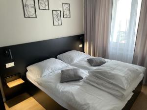 Легло или легла в стая в Apartamenty Magia z bezpłatnym parkingiem i klimatyzacją