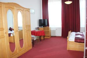 Postel nebo postele na pokoji v ubytování Hotel Central