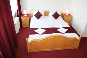 Postel nebo postele na pokoji v ubytování Hotel Central