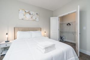 Ένα ή περισσότερα κρεβάτια σε δωμάτιο στο Stylish 1BR in at the Crossing