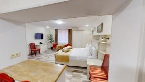 Postel nebo postele na pokoji v ubytování Aspar Boutique Hotel