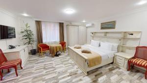 Postel nebo postele na pokoji v ubytování Aspar Boutique Hotel