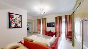 TV a/nebo společenská místnost v ubytování Aspar Boutique Hotel