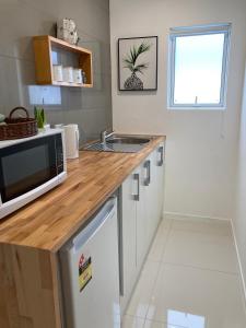 Kuchyň nebo kuchyňský kout v ubytování Kauri Point Village