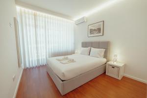 Postelja oz. postelje v sobi nastanitve Grand Premium Boavista Apartment by Vacationy