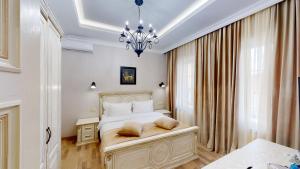 Postel nebo postele na pokoji v ubytování Aspar Boutique Hotel