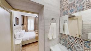 Koupelna v ubytování Aspar Boutique Hotel + 37 fotografií