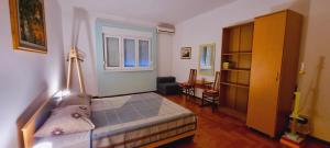 Ένα ή περισσότερα κρεβάτια σε δωμάτιο στο Apartment O.K.