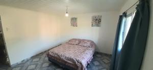 Postel nebo postele na pokoji v ubytování Hostel Doblas Argentina